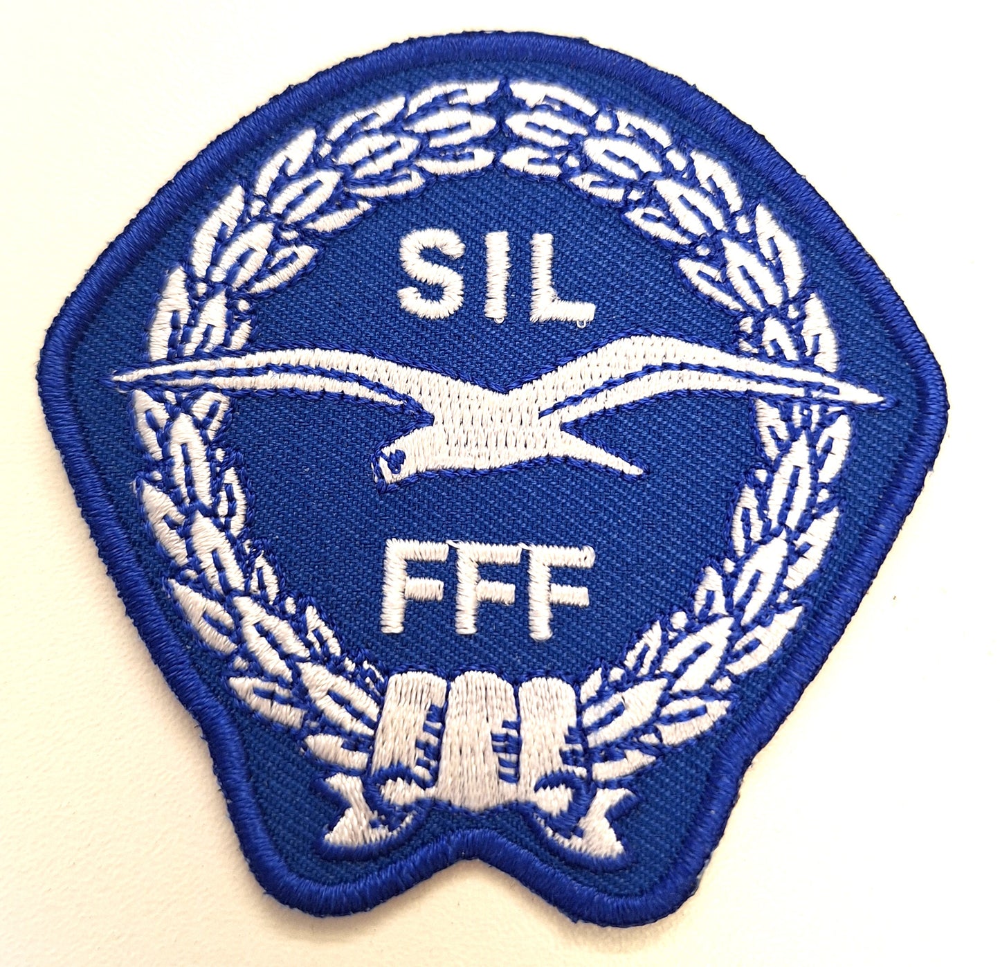 SIL-hihamerkki, sininen